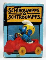 Les Schtroumpfs - Schleich - 40210 Schtroumpf en Voiture Rouge (en Boite)