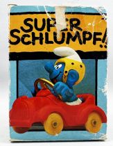 Les Schtroumpfs - Schleich - 40210 Schtroumpf en Voiture Rouge (en Boite)