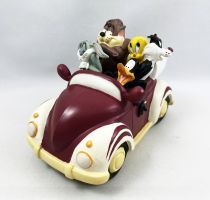 Looney Tunes - Tirelire Résine Démons & Merveilles - Les Looney Tunes en voiture (Bugs, Daffy, Taz, Titi & Sylvestre)