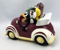 Looney Tunes - Tirelire Résine Démons & Merveilles - Les Looney Tunes en voiture (Bugs, Daffy, Taz, Titi & Sylvestre)