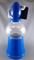 M&M\'s Candy Dispenser - Blue with Saluda al Rey Sign on Blue Counter Top Dispenser