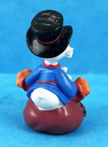 Scrooge - Disney PVC figure - Scrooge sitting on his gold