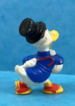 Scrooge - Disney PVC figures - Scrooge with his Dollars