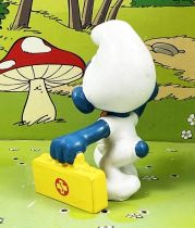 The Smurfs - Schleich - 20054 First Aid Smurf (yellow case w/mark)