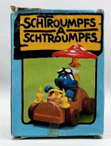 The Smurfs - Schleich - 40232 Smurf driving a smurf mushroom car (w/box)