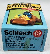 The Smurfs - Schleich - 40232 Smurf driving a smurf mushroom car (w/box)