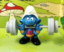 The Smurfs - Schleich - 40507 Smurf weight lifter (red)