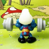 The Smurfs - Schleich - 40507 Smurf weight lifter (red)