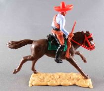 Timpo - Mexicans - Mounted (Moulded Belt) Left Arm Down Light Blue Jacket (Winchester) Black Legs Dark Brown Galloping Horse